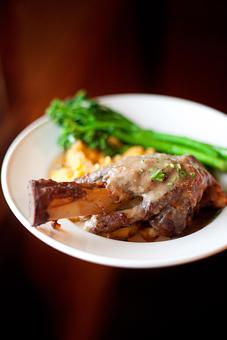 Product: Braised Lamb Shanks - Black Forest Cafe and Bakery in Amherst, NH American Restaurants Product: Braised Lamb Shanks - Black Forest Cafe and Bakery in Amherst, NH American Restaurants