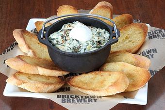 Product: Artichoke hearts, spinach and a
blend of cheeses. Served with
toasted baguettes for dipping. - Bricktown Brewery in Oklahoma City, OK Restaurants/Food & Dining