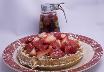 Product: Fresh strawberries top our golden malted waffle - Brunchie's Breakfast Brunch and Lunch in Tampa - Tampa, FL American Restaurants