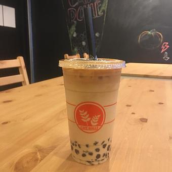 Product: Our Signature Drink: Blue Bottle Boba. Blue Bottle Coffee w/ Black Milk Tea & drops of Condensed Milk & Boba. - Café Roulé in Temple City - Temple City, CA Cafe Restaurants