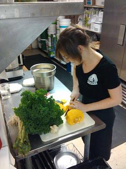 Product: Eva in the kitchen - Capitol Grounds in Montpelier, VT Coffee, Espresso & Tea House Restaurants