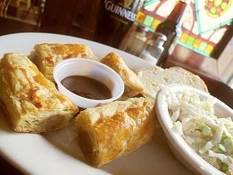 Product: Irish sausage meat wrapped in puff pastry & baked. - Celtic Ray Irish Pub in Punta Gorda Downtown Historic Distrcy - Punta Gorda, FL Bars & Grills