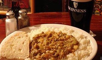 Product: Chicken breast pieces, vegetables, & cider in a mild curry over rice. - Celtic Ray Irish Pub in Punta Gorda Downtown Historic Distrcy - Punta Gorda, FL Bars & Grills