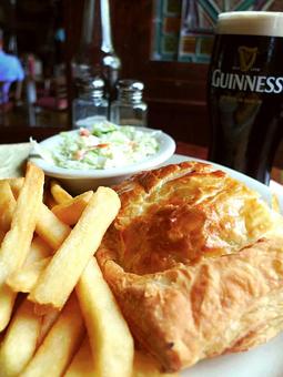 Product: Corned beef, swiss cheese, sauerkraut, & thousand island baked in a puff pastry - Celtic Ray Irish Pub in Punta Gorda Downtown Historic Distrcy - Punta Gorda, FL Bars & Grills