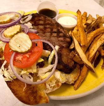 Product: Prime Rib Sandwich - Charlie Brown's Neighborhood Bar & Grill in San Antonio, TX American Restaurants