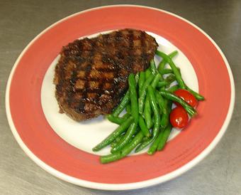 Product: 16 oz Ribeye with one side - Charlie Brown's Neighborhood Bar & Grill in San Antonio, TX American Restaurants