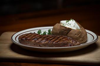 Product: Certified Angus 8 or 14 ounce New York Strip - Chuck's Steak House in Restaurant Row - Myrtle Beach, SC Steak House Restaurants