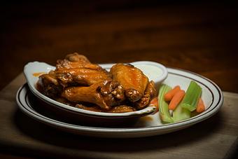 Product: ten wings, spicy and sweet at the same time - Chuck's Steak House in Restaurant Row - Myrtle Beach, SC Steak House Restaurants