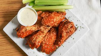 Product: Hot Garlic Parmesan wings - Cleats Club Seat Grille Old Brooklyn in Cleveland, OH American Restaurants