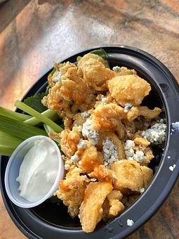 Product: Buffalo Mahi Bites - Coastal Cravings in Duck, NC American Restaurants