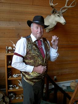 Product: DARWIN as Sleazy Bare Owner for Fur Rendezvous - Darwin's Theory in Anchorage, AK Nightclubs