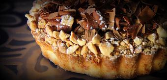 Product: Chocolate Cashew Caramel Tart - Delectables Catering and Venue in U of A, Fourth Avenue, Downtown, on Street Car Line - Tucson, AZ American Restaurants