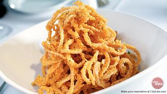 Product: Crystal Hot Sauce Onion Rings - Desi Vega's Steakhouse in Warehouse District/CBD - New Orleans, LA Seafood Restaurants