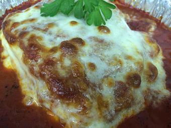 Product: Homemade Baked Lasagna just the way grandma taught us!  Layers of homemade marinara sauce, 3 different cheeses, noodles, Italian sausage, ground beef, and seasonings. Topped with baked provolone cheese and served with garlic bread and dinner salad. - Difilippo's Pizza in Ozark, AL Pizza Restaurant