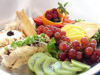Product: Our Imported Cheese and Fruit Platter is a wonderful appetizer for a summer party. Served with an assortment of crackers and freshly sliced baguettes. - Elyse's Catering, in Tumwater, WA Dessert Restaurants