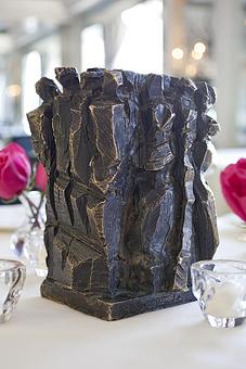 Product: Bronze sculptures created by acclaimed Swiss artist Ivo Soldini adorn each table. - Everest in The Loop - Chicago, IL French Restaurants