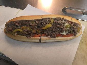 Product: Cheese Steak Hoagie with lettuce, tomato, onion and hot peppers - Farmer John's Food Market in Hammonton, NJ Delicatessen Restaurants