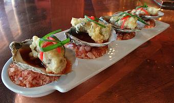 Product: San Francisco Bay's Marin Miyagi's tempura fried oysters atop spicy Bloody Mary - Fats Asia Bistro in Roseville - Roseville, CA Chinese Restaurants