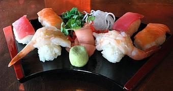 Product: assorted sashimi style sushi, wakame salad, pink ginger and wasabi - Fats Asia Bistro in Roseville - Roseville, CA Chinese Restaurants