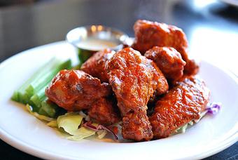 Product: Sriracha Wings. Fried wings tossed in sriracha buffalo sauce served with creamy miso and celery sticks. - Fats Asia Bistro in Roseville - Roseville, CA Chinese Restaurants