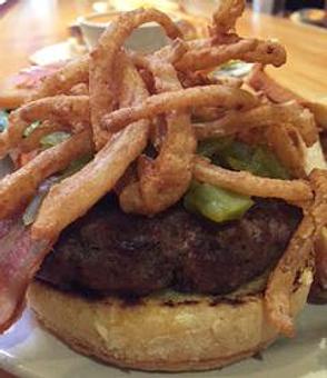 Product: Beef Burger Topped with Smokey Jalapeño Queso - Foothills Brewing in Winston Salem, NC American Restaurants