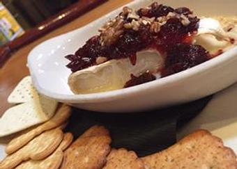 Product: Baked Brie, with stout cherries & toasted pecans - Foothills Brewing in Winston Salem, NC American Restaurants