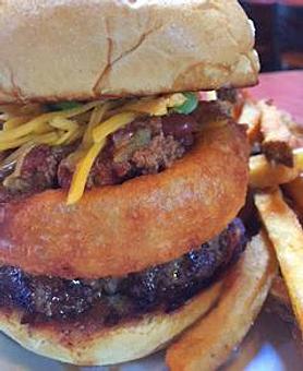 Product: Buffalo burger served Carolina style. - Foothills Brewing in Winston Salem, NC American Restaurants