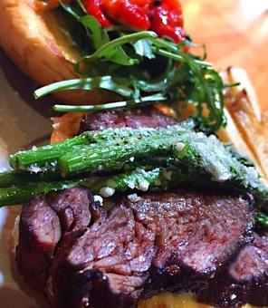 Product: Spiced beef tenderloin with grilled romano asparagus - Foothills Brewing in Winston Salem, NC American Restaurants