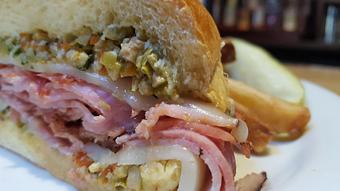 Product: Shanewich Muffaletta ham, salami and provolone - Foothills Brewing in Winston Salem, NC American Restaurants