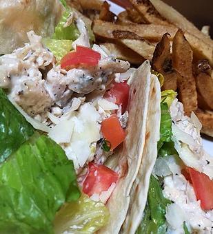 Product: Caesar chicken salad with tomatoes, parmesan and romaine - Foothills Brewing in Winston Salem, NC American Restaurants
