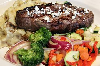 Product: 14oz ribeye with bleu cheese butter, garlic mashed potatoes and sautéed veggies - Foothills Brewing in Winston Salem, NC American Restaurants