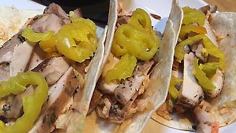Product: Smoked chicken thighs, chipotle slaw and tangy banana peppers - Foothills Brewing in Winston Salem, NC American Restaurants