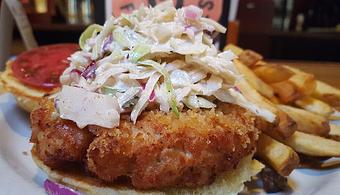 Product: Smoked chicken patty with Alabama white bbq - Foothills Brewing in Winston Salem, NC American Restaurants