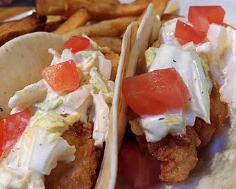 Product: Fried shrimp, white BBQ slaw, fried jalapenos and diced tomatoes - Foothills Brewing in Winston Salem, NC American Restaurants