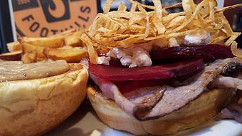 Product: Roast beef, roasted beets, goat cheese, Worcestershire mayo and fried potato strings - Foothills Brewing in Winston Salem, NC American Restaurants