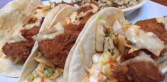 Product: Tried chicken tenders, napa cabbage slaw and white sauce - Foothills Brewing in Winston Salem, NC American Restaurants