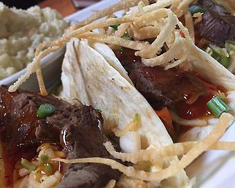 Product: Beef tenderloin, apple ginger slaw and sweet chili sauce - Foothills Brewing in Winston Salem, NC American Restaurants