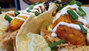 Product: Smokey pulled chicken, spicy papaya and Napa cabbage, lime sour cream and scallions - Foothills Brewing in Winston Salem, NC American Restaurants