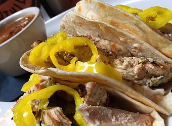 Product: Grilled chicken, bleu cheese siracha slaw, and banana peppers - Foothills Brewing in Winston Salem, NC American Restaurants