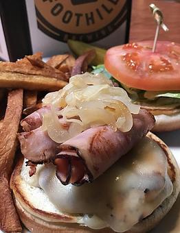 Product: Grilled chicken, ham, sweet onions, Swiss cheese, lettuce, tomato and brown mustard - Foothills Brewing in Winston Salem, NC American Restaurants