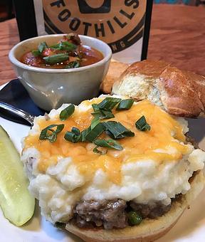 Product: Shepherd’s pie, mashed potatoes, bacon, cheddar, on brioche. Choice of side. - Foothills Brewing in Winston Salem, NC American Restaurants