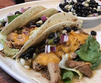 Product: “Ziggy Piggy”- Chipotle lime pork, black bean and corn salsa verde, cheddar cheese and lettuce - Foothills Brewing in Winston Salem, NC American Restaurants