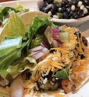 Product: Chicken, black bean and corn salsa verde, cheddar and lettuce. - Foothills Brewing in Winston Salem, NC American Restaurants