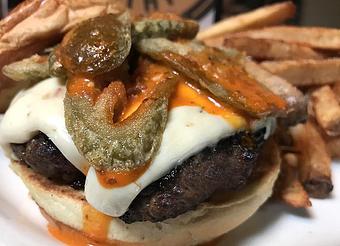 Product: Brew-house burger with brew-house sauce, pepper jack cheese and fried jalapeños - Foothills Brewing in Winston Salem, NC American Restaurants