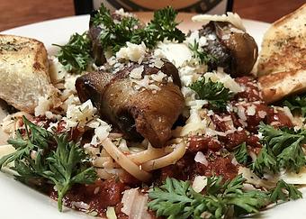 Product: Spaghetti, bacon wrapped smoked meatballs, marinara, Parmesan and garlic bread - Foothills Brewing in Winston Salem, NC American Restaurants