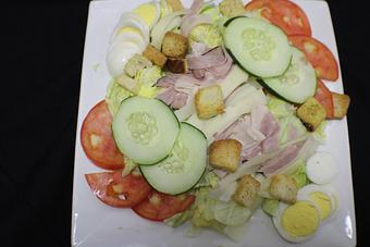 Product: Chef's Salad - Iceburg, julienne ham, turkey & swiss with tomato, egg, cucumber and croutons - Franconia Heritage Restaurant in Telford, PA American Restaurants