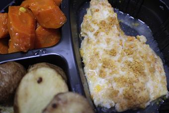 Product: Cheddar Baked Haddock with roasted potatoes and glazed carrots - Franconia Heritage Restaurant in Telford, PA American Restaurants
