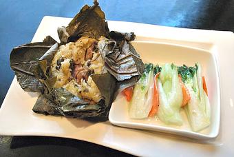 Product: Lo Mai Gai    Sticky rice, Chinese sausage, chicken thigh, onions & mushrooms 
steamed in a lotus leaf - Frank Fats in Downtown Sacramento - Sacramento, CA Chinese Restaurants