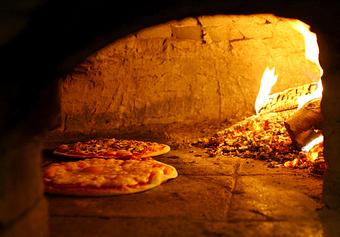 Product: Authentic wood-burning pizza oven cooks pizza at 800 degrees - Frankie and Fanucci's Wood Oven Pizzeria in Mamaroneck Village - Mamaroneck, NY Italian Restaurants