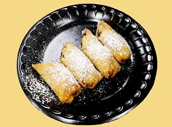 Product: Dessert: Banana Roll.  Deep Fried Bananas and Anko (Red Bean Paste) topped with Powdered Sugar.  2 for $1.69 - Getaxpress in Hanford, CA Bars & Grills